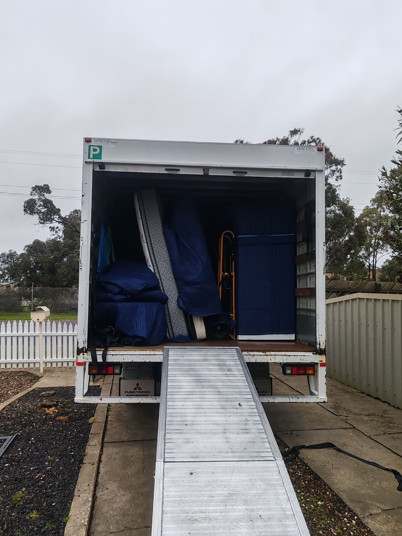 Furniture loaded and secured in the back of the removals truck